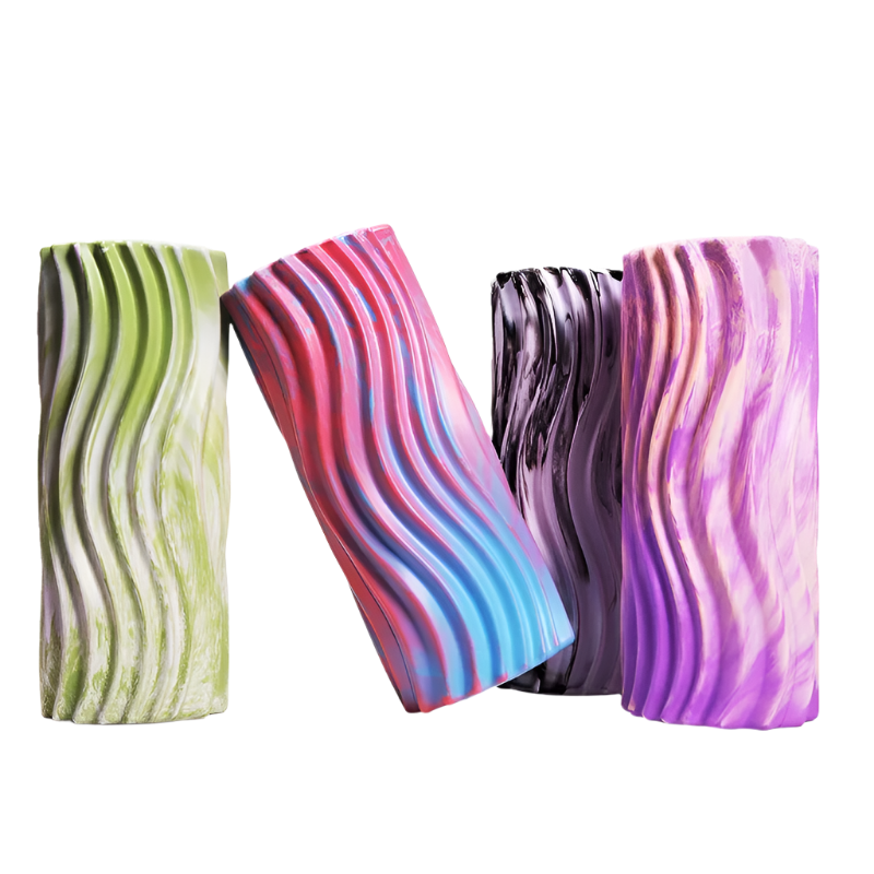 Four colorful phone cases with wavy patterns on a white background